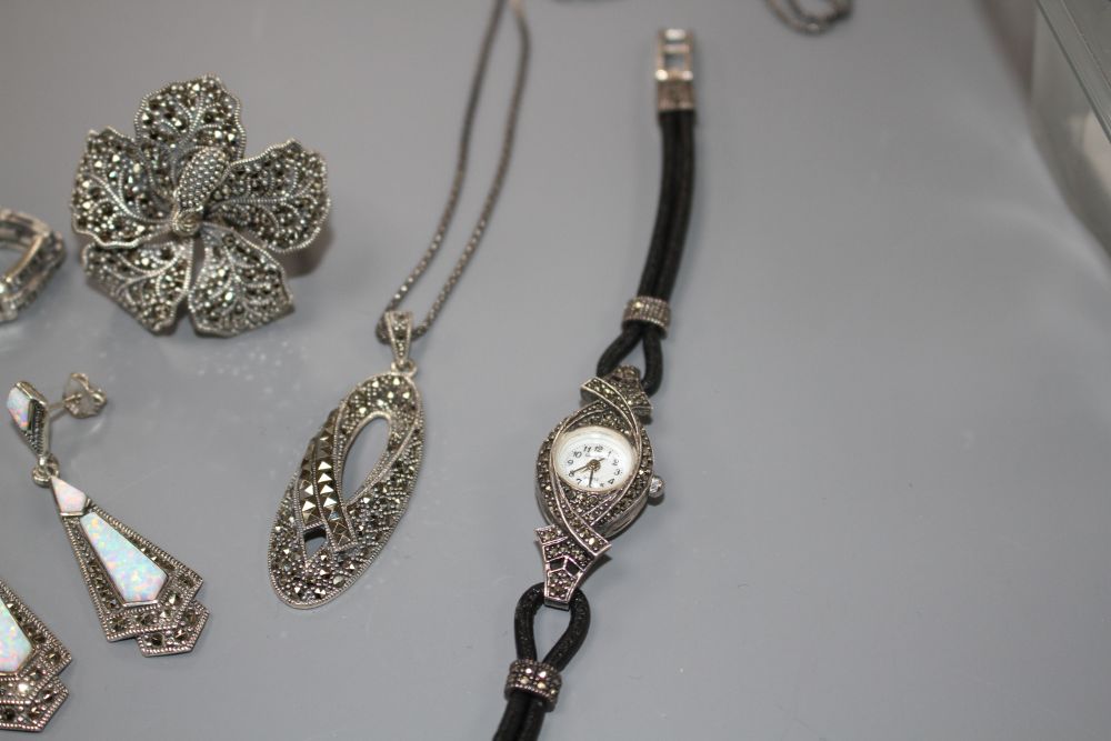 Six assorted items of marcasite jewellery including a pair of earrings, ring, brooch, bracelet and a Gianni Vecci ladys watch.